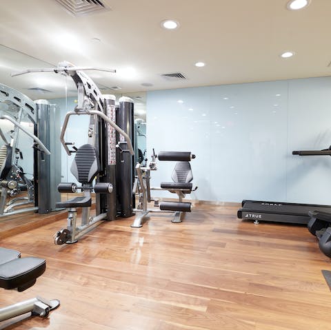 Hit the building's shared gym to keep on top of your fitness game