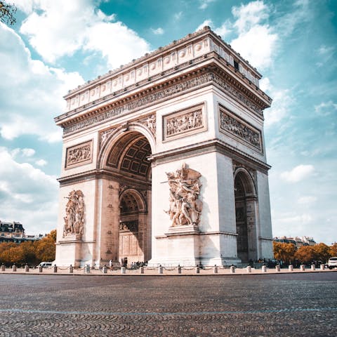 Visit the iconic Arc de Triomphe nearby