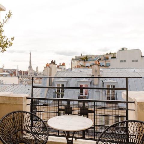 Sip your morning coffee on the private balcony while taking in views of the iconic Eiffel Tower