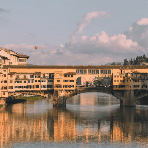 Begin your stay with an inspiring stroll across Ponte Vecchio