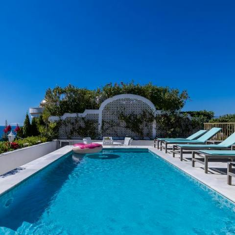 Swim in the rooftop private pool