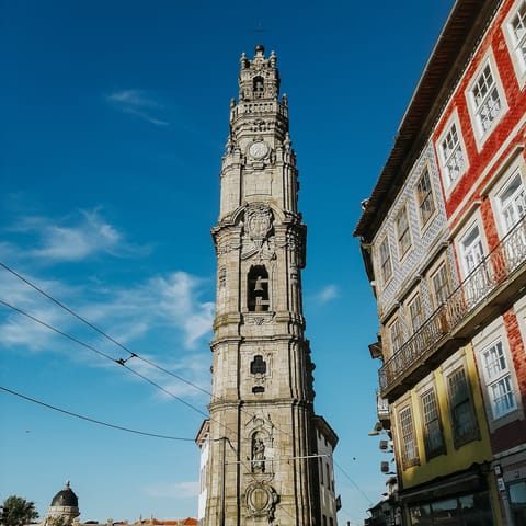 Walk past Clérigos Tower as you head into town