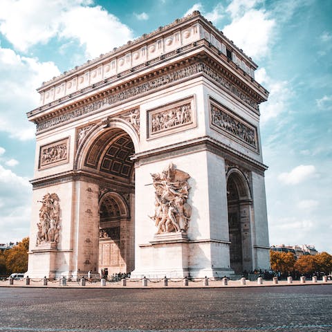 Visit the iconic Arc de Triomphe, a seven-minute drive away