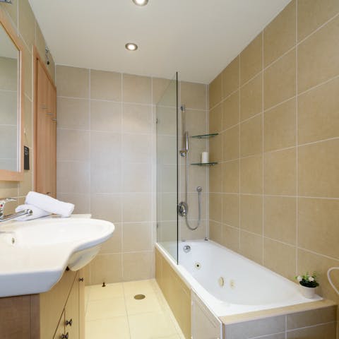 Sneak away for a soak in the Jacuzzi bathtub