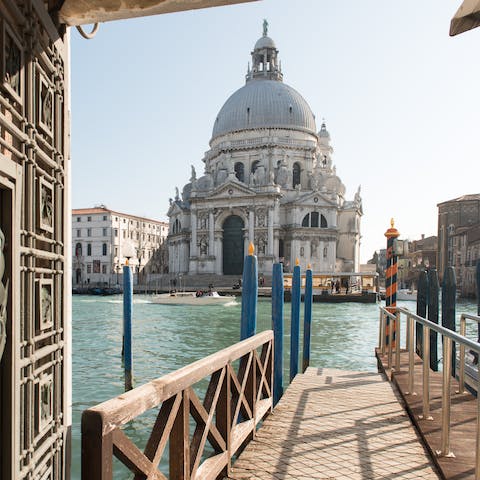 Arrive by water taxi at the palace's exclusive jetty