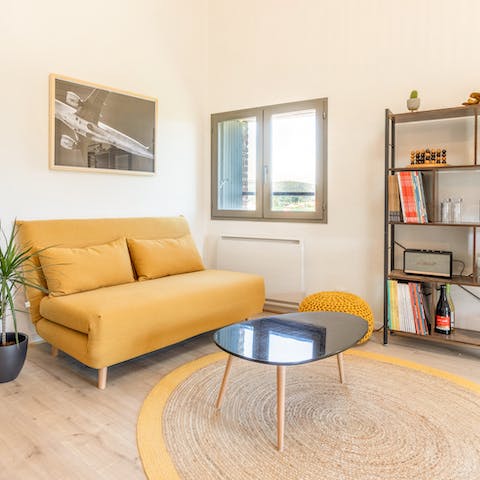 Curl up with a book on the comfy sofa in the second lounge area