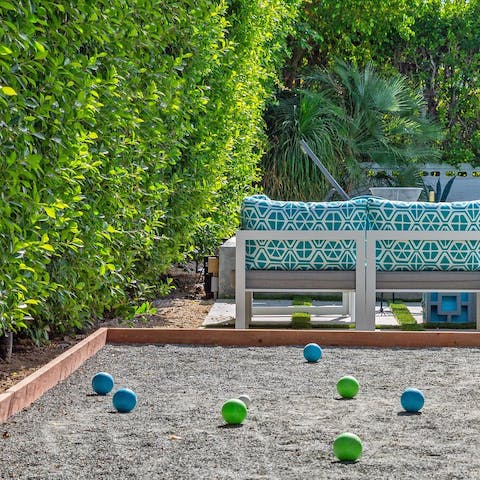 Play bocce with your loved ones on cooler mornings