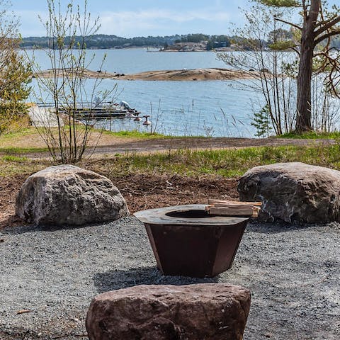 Gather around the fire pit and enjoy views across the archipelago