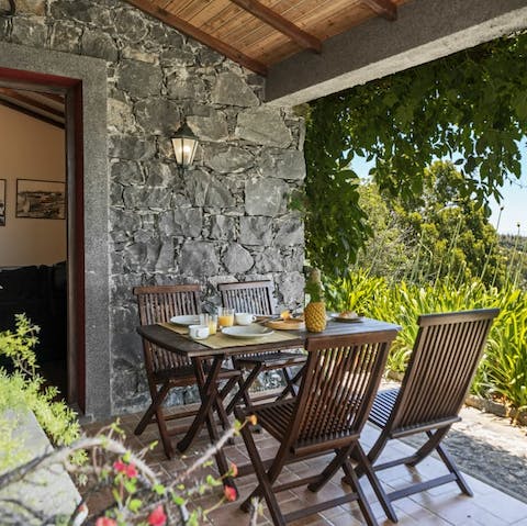 Enjoy a meal alfresco in the cool shade of your covered patio