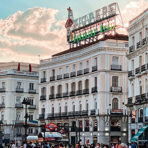 Mingle with locals and tourists in Puerta del Sol – only a ten–minute walk away
