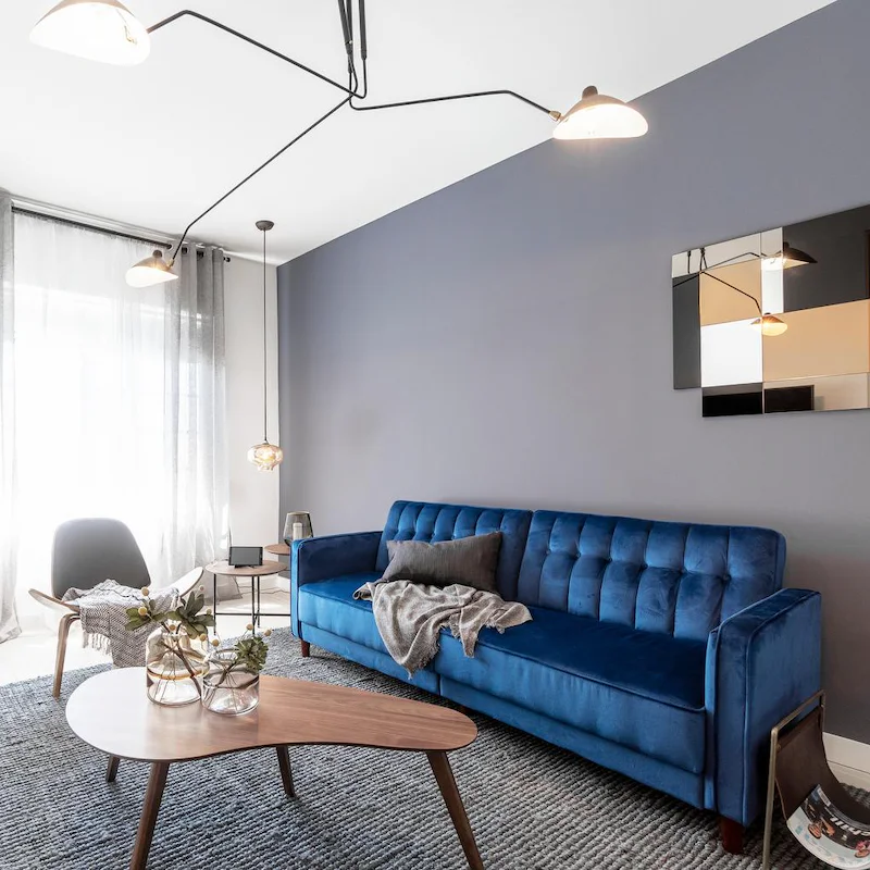 Get comfortable on the royal blue sofa