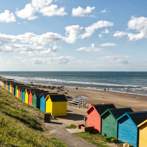 Sink your toes in the sand at Whitby Beach across the road, a two-minute walk away