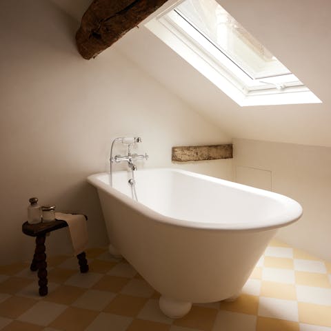Unwind with a relaxing soak in the freestanding bathtub