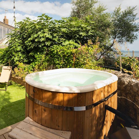 Serenade your senses with the sound of the waves and  a long soak in the hot tub 