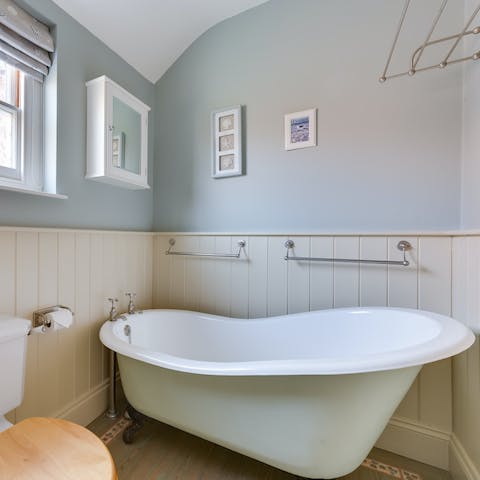 Treat yourself to a long soak in the freestanding tub