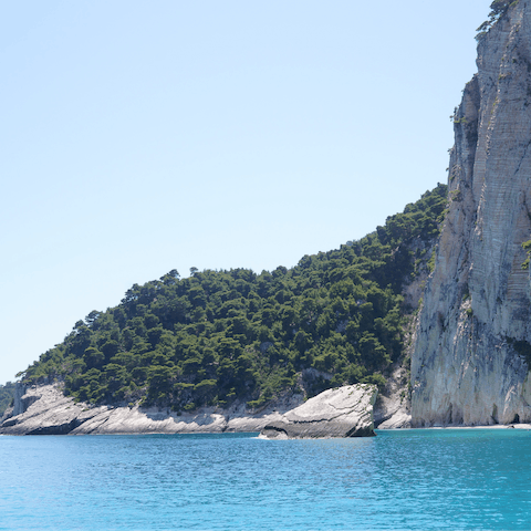 Dive into the crystal turquoise waters off of Gerakas Beach, a short walk away