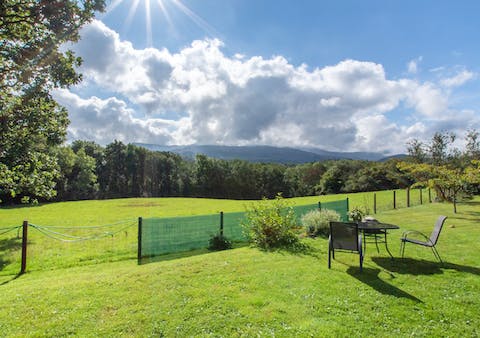 Dine alfresco and admire the dramatic landscape of woodland and mountains