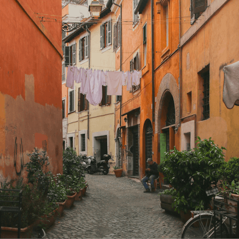 Wind your way through the historic streets of Trastevere 