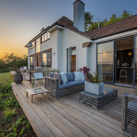 Hang out on the full-length decking with breathtaking views over the surrounding Somerset landscapes