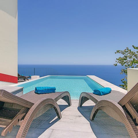 Lounge by the pool with a jaw-dropping Atlantic Ocean view
