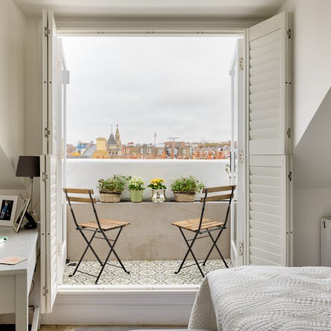 Wake up in the main bedroom and step out onto its private balcony