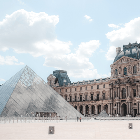 Visit the Louvre Museum, fifteen minutes away on the metro