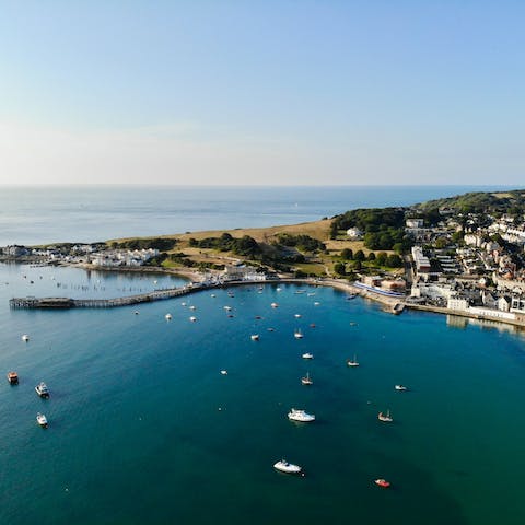 Immerse yourself in seaside pastimes in Swanage, a five-minute stroll away