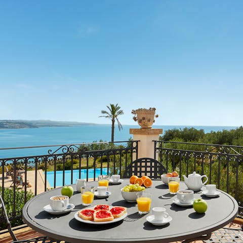 Sit down for an alfresco breakfast with an ocean view