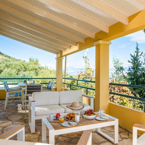 Gaze out at views of the rolling hills around you from the balcony