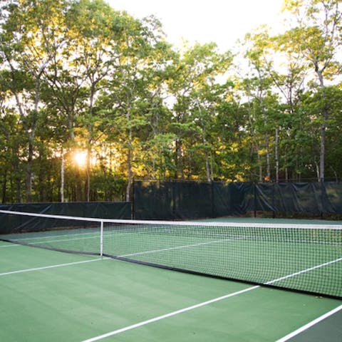 Play some tennis on the private court