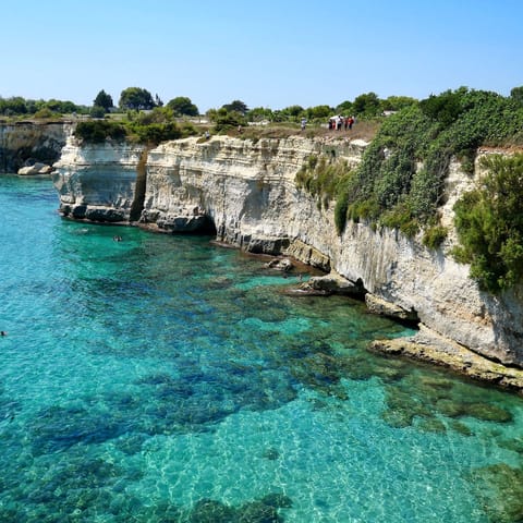 Explore Puglia, including the white sands and turquoise waters of Marina di Pescoluse, an fifteen-minute walk or two-minute drive away