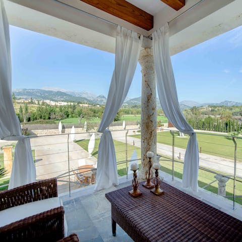 Take in majestic views from the covered balcony