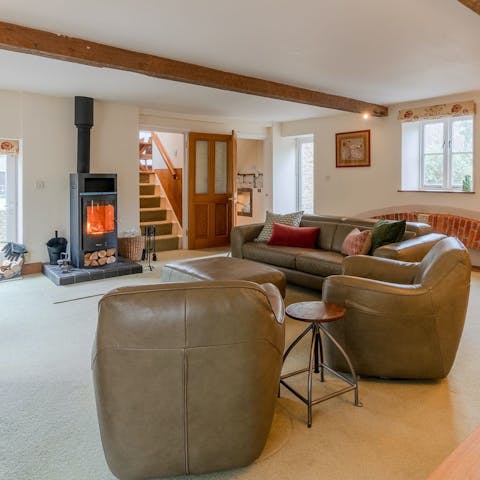 Settle down in front of the log burner for a cosy evening in