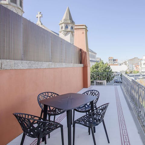 Enjoy a glass of Port on the terrace with its vistas over the neighbourhood and local church