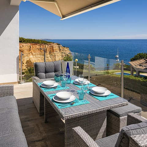 Admire the ocean views while you enjoy sipping on Cava cocktails on the balcony