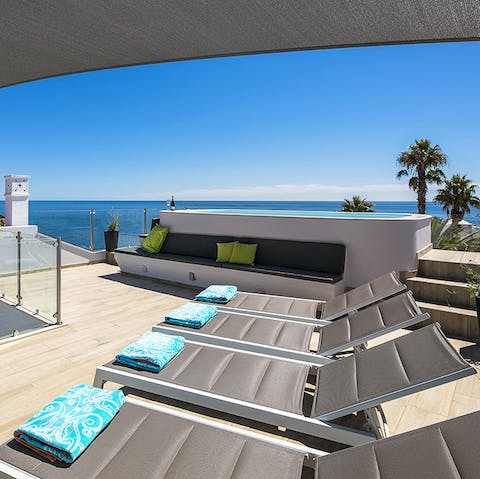 Soak up the sun in absolute peace on the contemporary roof terrace