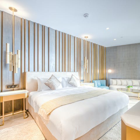 Wake up in the luxurious gold-accented bedroom feeling rested and ready for another day of Dubai sightseeing