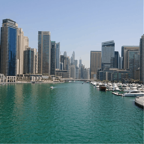 Explore swish Dubai Marina, a twelve-minute drive away