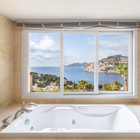 Sink into the bathtub for a soak session with a view