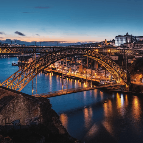 Take some photos of the iconic D. Luís I Bridge, a five-minute walk