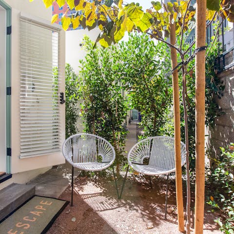 Relax with a glass of Californian wine in the private courtyard garden