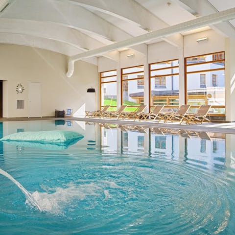 Do a few lengths of front crawl in the shared indoor swimming pool