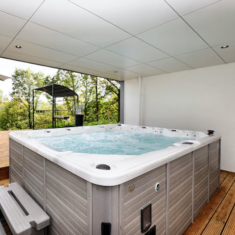 Take a long, luxurious soak in the alfresco hot tub