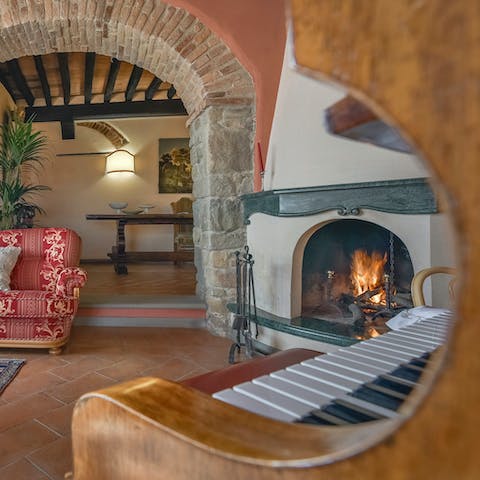Show off your piano skills by the fireside