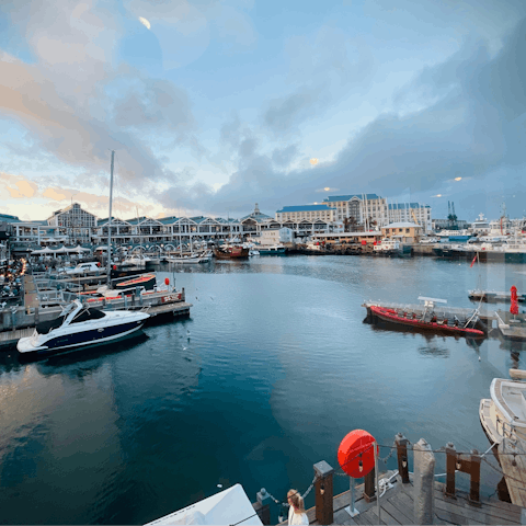 Dander along to the shops and restaurants of the V&A Waterfront nearby