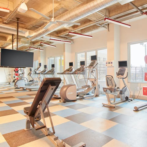 Hit the building's gym and keep on top of your fitness regime