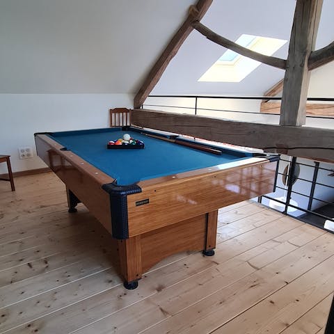 Enjoy some friendly competition with light-hearted games on the mezzanine
