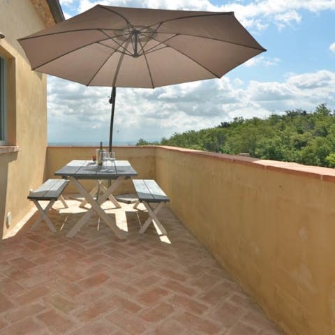 Take in the views over the resort and valley from the private terrace