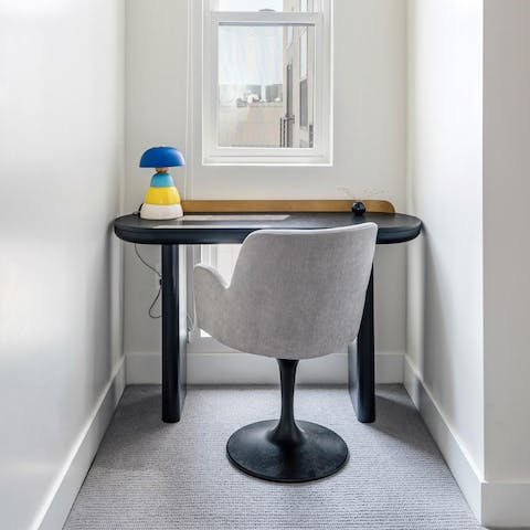 Catch up on work at the dedicated desk space in your quiet bedroom