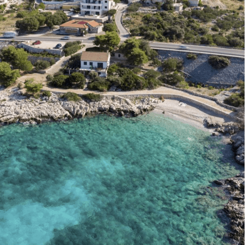 Pack your beach towel and sun cream and take the short 150-metre walk down to the nearby pebble beach